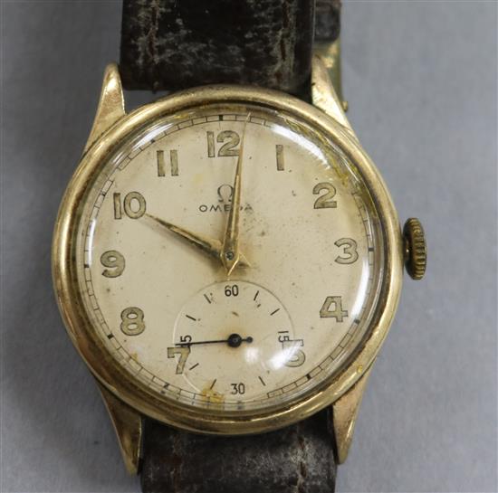 A gentlemans early 1940s 9ct gold Omega manual wind wrist watch.